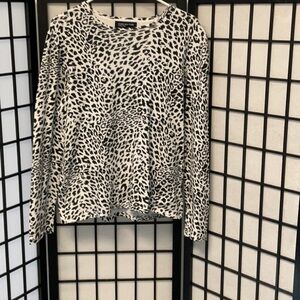 VintageAnimal print top measures like a medium